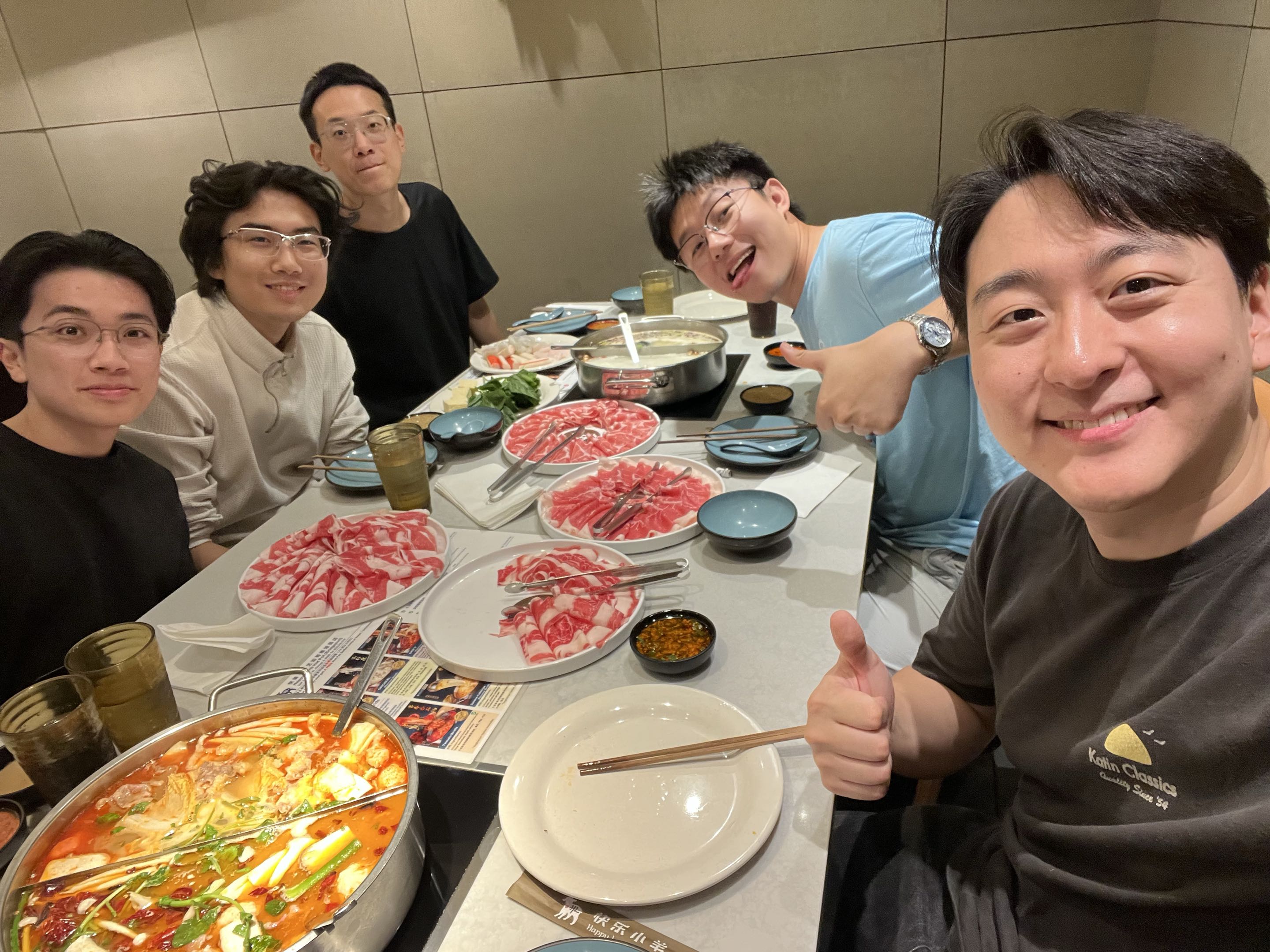Lab dinner gathering around hot pot